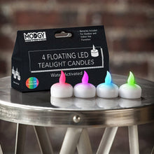 Load image into Gallery viewer, Multi-Color Lumizu Lights Four pack of LED water activated candles..